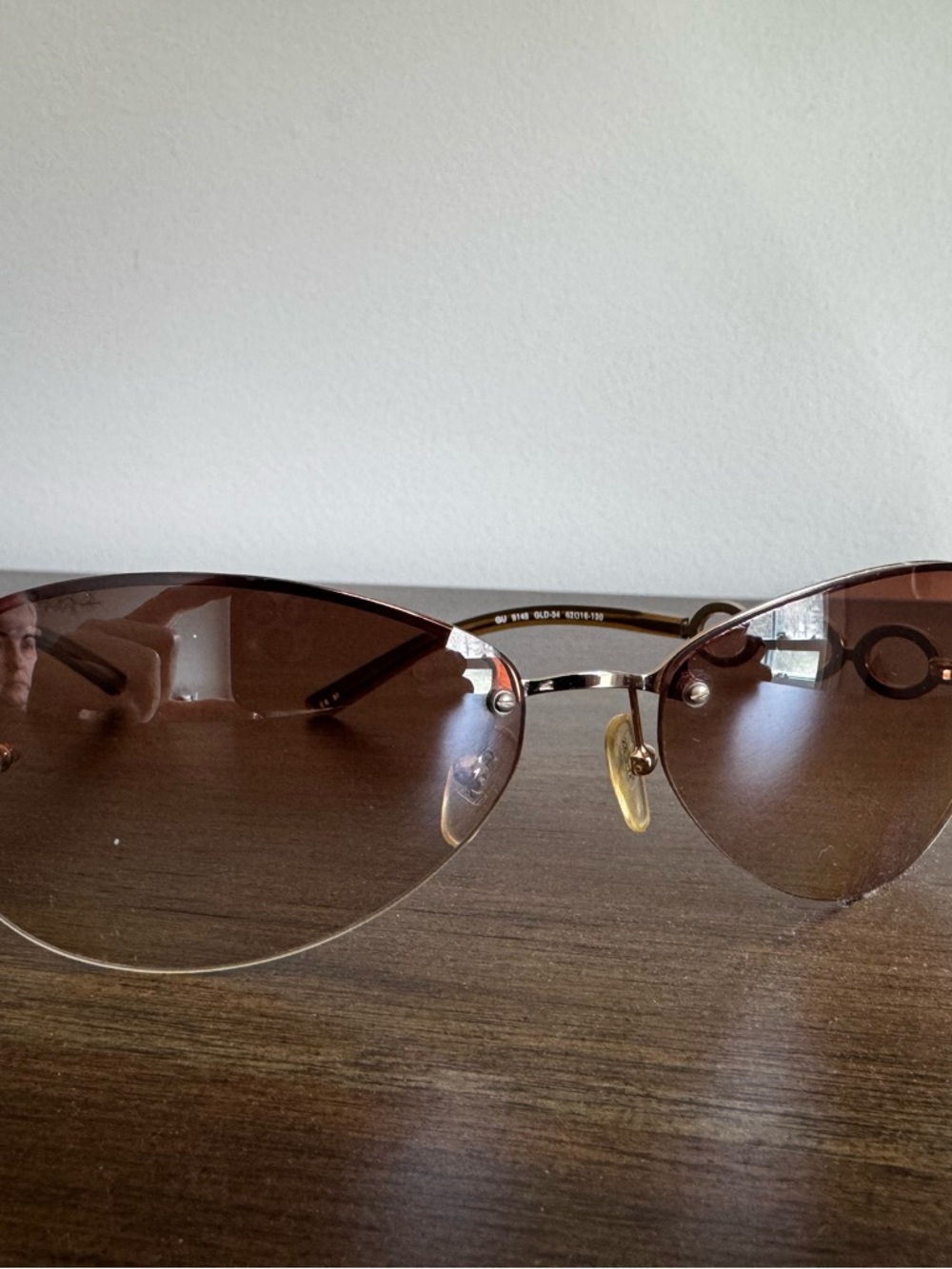 Guess Gold-Accent Rimless Sunglasses with Brown Lenses